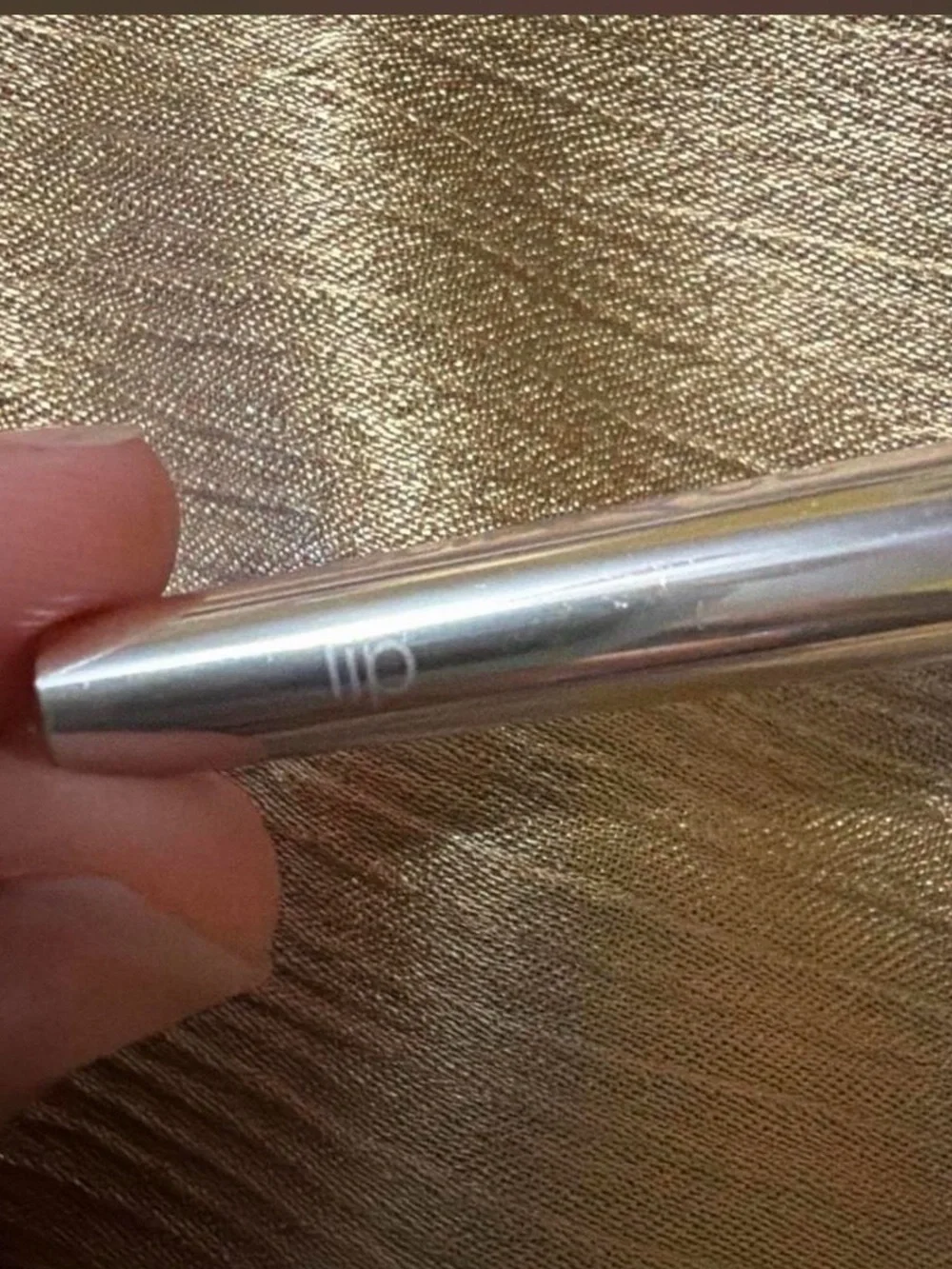 Clinique retractable brush